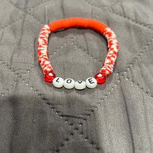 Handmade bracelet by 9yr old. 6.3” circumference. Clay beads, soft & bright.